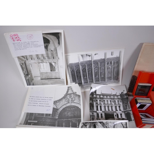 82 - A quantity of vintage black and white architectural photographs and slides, largest 30 x 21cm