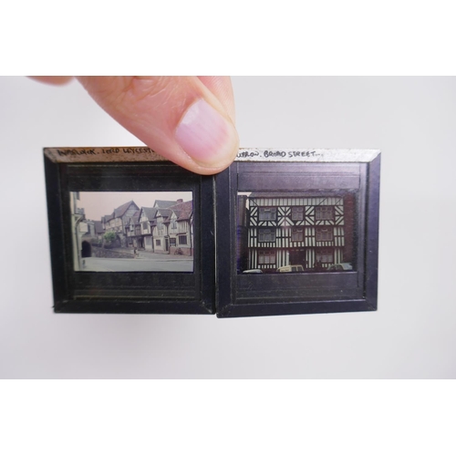 82 - A quantity of vintage black and white architectural photographs and slides, largest 30 x 21cm