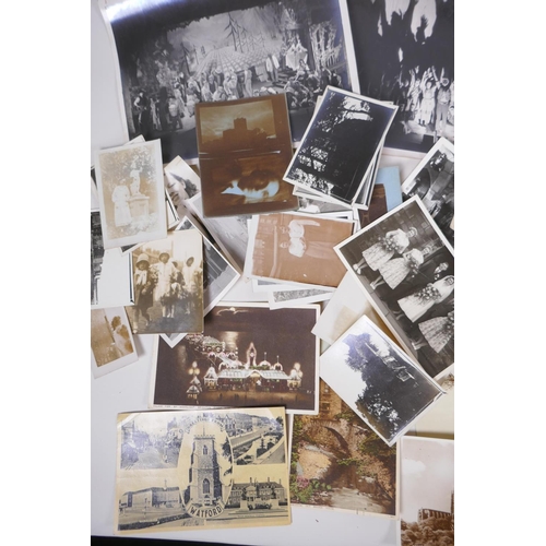 85 - A large quantity of late C19th and early C20th black and white photographs and postcards, of social ... 