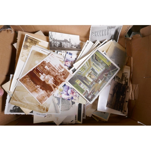 85 - A large quantity of late C19th and early C20th black and white photographs and postcards, of social ... 