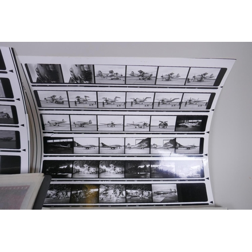 86 - Three albums of photographic negatives including many of military vehicles and armour, motorbikes, a... 