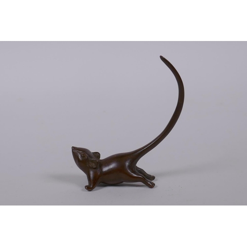 89 - A Japanese style bronze okimono rat, mark to base, 8cm high