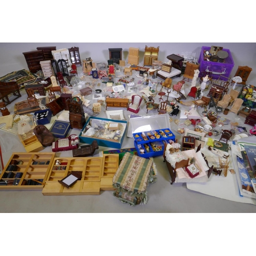 9 - An extensive collection of dolls' house furniture and fittings including carpets, accessories, tea s... 