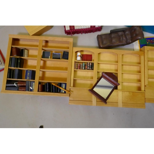 9 - An extensive collection of dolls' house furniture and fittings including carpets, accessories, tea s... 