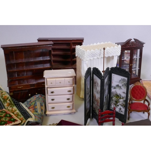 9 - An extensive collection of dolls' house furniture and fittings including carpets, accessories, tea s... 