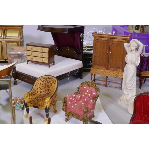 9 - An extensive collection of dolls' house furniture and fittings including carpets, accessories, tea s... 