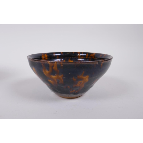 91 - A Chinese Jizhou Kiln stem bowl with tortoise shell glaze, and a similar bowl, 12cm high