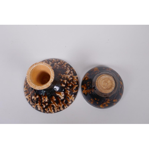 91 - A Chinese Jizhou Kiln stem bowl with tortoise shell glaze, and a similar bowl, 12cm high