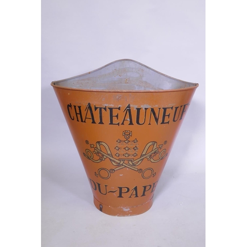 92 - A French style orange painted metal grape picker's hopper, decorated with a Chateau Neuf du Pape des... 