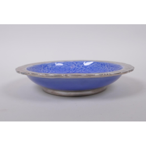 95 - A Chinese blue and silver glazed porcelain dish with lobed rim, decorated with a dragon, phoenix and... 