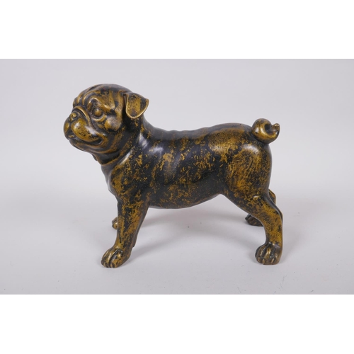 99 - A gilt bronze pug dog, 21cm long