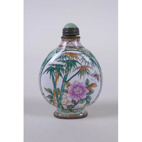 104 - A canton enamel snuff bottle decorated with insects amongst flowers and bamboo, Chinese 4 character ... 