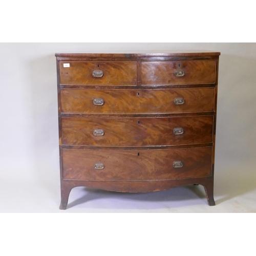 1067 - A Georgian mahogany bowfront chest of two over three drawers with cock beaded detail and brass plate... 