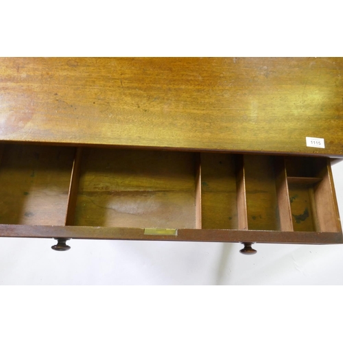 1115 - A C19th mahogany writing table, the central drawer with fitted compartments flanked by two smaller, ... 