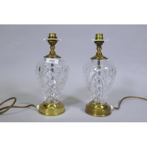 122 - A pair of Waterford 'Kilkenny' crystal glass table lamps, 27cm high