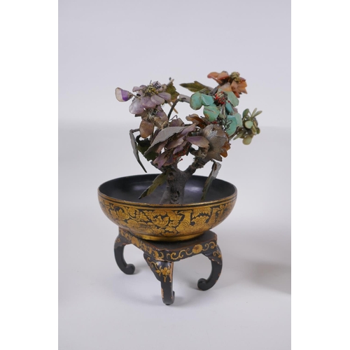 133 - An antique Chinese hardstone tree on a lacquered and gilt stand, together with three other hardstone... 