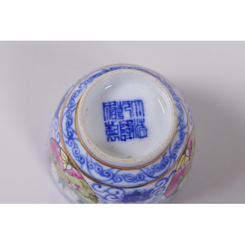 139 - A pair of Chinese blue and white porcelain tea bowls with polychrome enamels panels depicting two fi... 