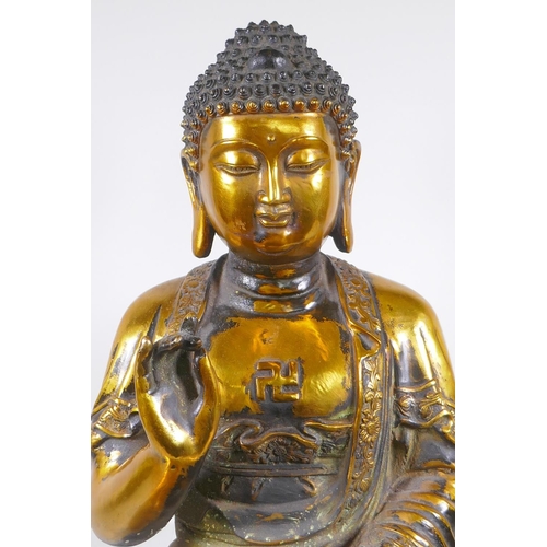 14 - A large Chinese gilt bronze figure of Buddha seated on a lotus throne, 6 character mark to back, 59c... 