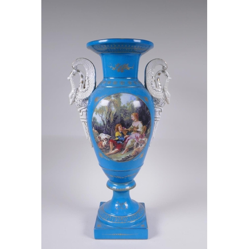 142 - A blue ground Sevres style porcelain urn with two swan shaped handles and decorative panels depictin... 