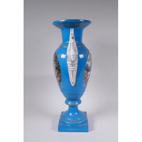 142 - A blue ground Sevres style porcelain urn with two swan shaped handles and decorative panels depictin... 