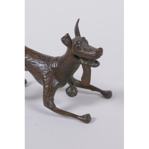 145 - A bronzed metal figure of an enthusiastic dog, modelled after the Disney Pixar dog Dante from the fi... 