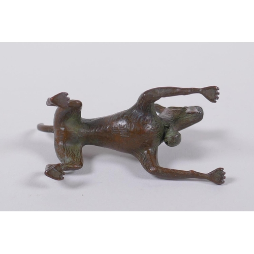 145 - A bronzed metal figure of an enthusiastic dog, modelled after the Disney Pixar dog Dante from the fi... 