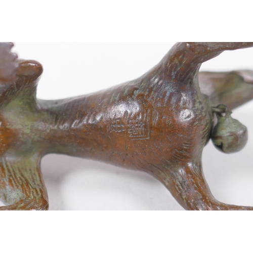 145 - A bronzed metal figure of an enthusiastic dog, modelled after the Disney Pixar dog Dante from the fi... 