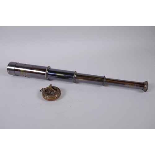 146 - A reproduction brass fob watch sundial compass, and a four draw brass telescope, 39cm long extended