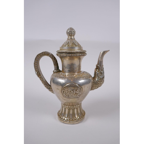 147 - A Tibetan white metal ewer, double vajra mark to base, 20cm high