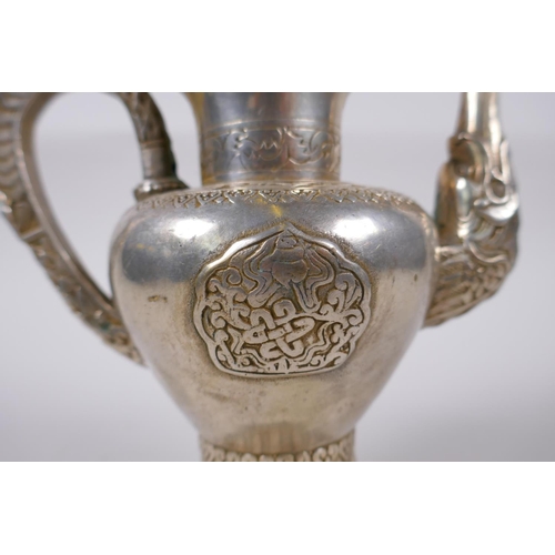 147 - A Tibetan white metal ewer, double vajra mark to base, 20cm high