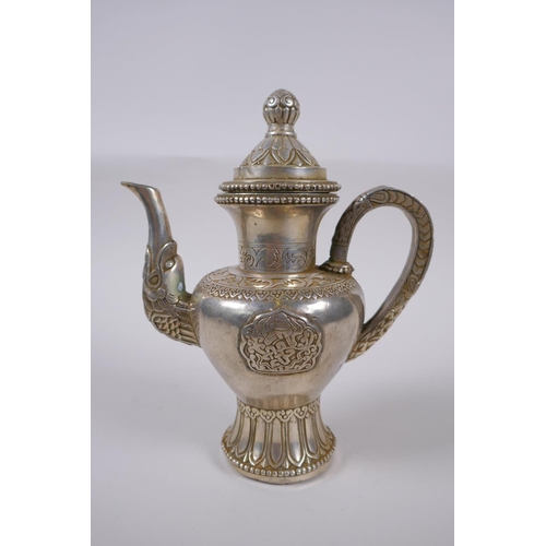 147 - A Tibetan white metal ewer, double vajra mark to base, 20cm high