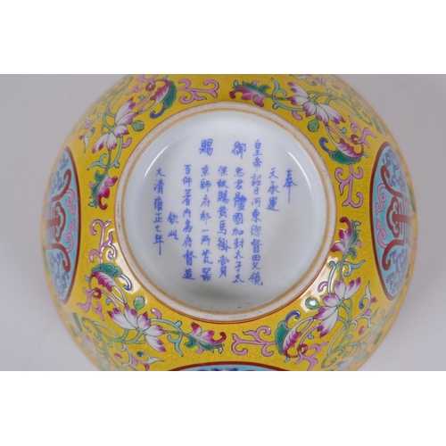 149 - A Chinese polychrome porcelain bowl decorated with auspicious symbols and flowers, character inscrip... 