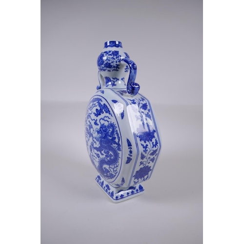 158 - A Chinese blue and white porcelain two handled moon flask of hexagonal form, decorated with a dragon... 