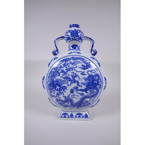 158 - A Chinese blue and white porcelain two handled moon flask of hexagonal form, decorated with a dragon... 