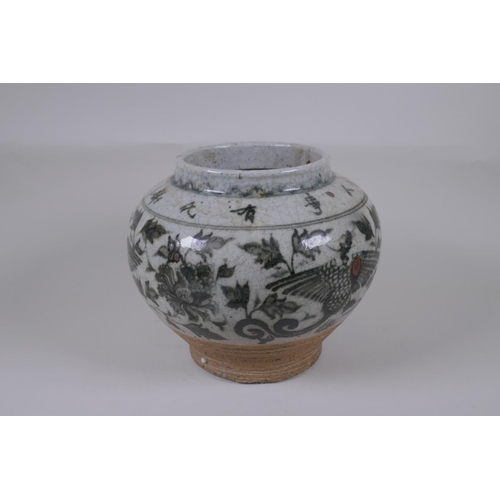 160 - A Chinese blue and white crackleware pottery vase with phoenix and lotus flower decoration, characte... 