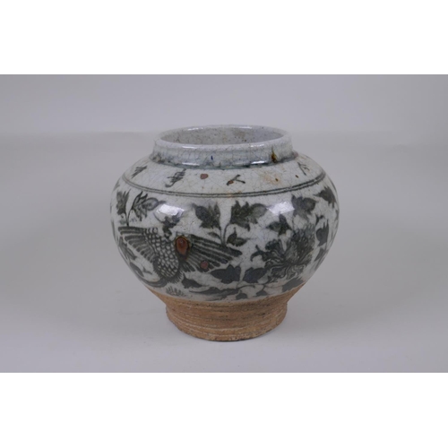 160 - A Chinese blue and white crackleware pottery vase with phoenix and lotus flower decoration, characte... 