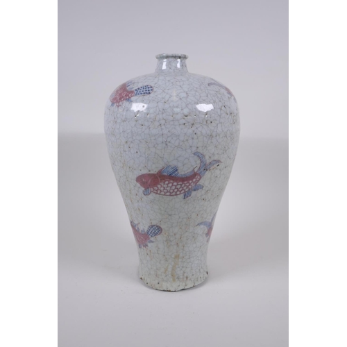 168 - A Chinese crackle ware pottery meiping vase with blue and red carp decoration, 32cm high