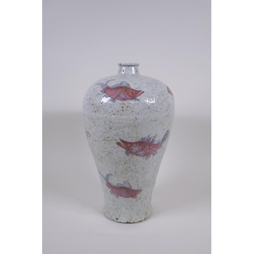 168 - A Chinese crackle ware pottery meiping vase with blue and red carp decoration, 32cm high