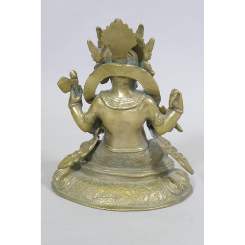 172 - Indian brass figure of Ganesh with a rat under foot, 20cm high