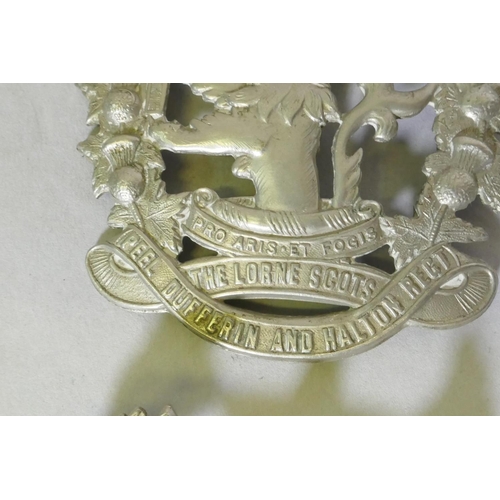 175 - A Lorne Scots, Peel, Dufferin and Halton Regt cap badge, 8cm and a Scottish rifles regimental cap ba... 