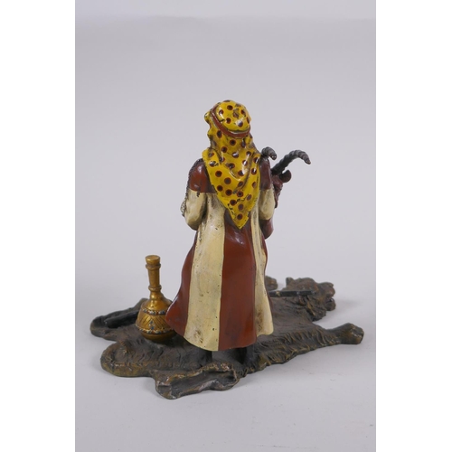 177 - A cold painted bronze figure of an Arab merchant, 14cm high