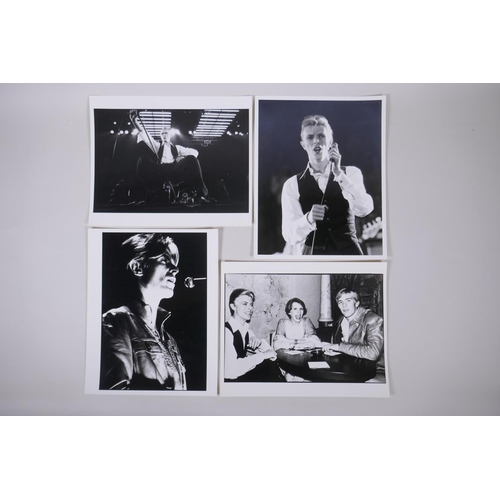 18 - A collection of four black and white press photographs of David Bowie, circa 1976, all with London F... 