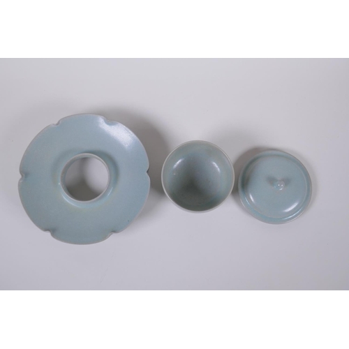 19 - A Chinese Ru ware style tea set comprising a tea bowl, cover and petal shaped saucer, 18cm diameter