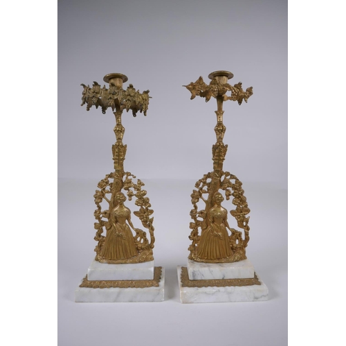 22 - A near pair of antique ormolu and marble candlesticks in the form of a lady with a lyre, 41cm high