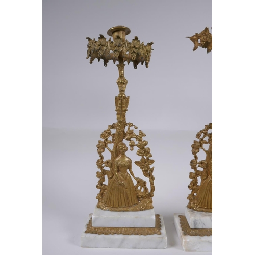 22 - A near pair of antique ormolu and marble candlesticks in the form of a lady with a lyre, 41cm high