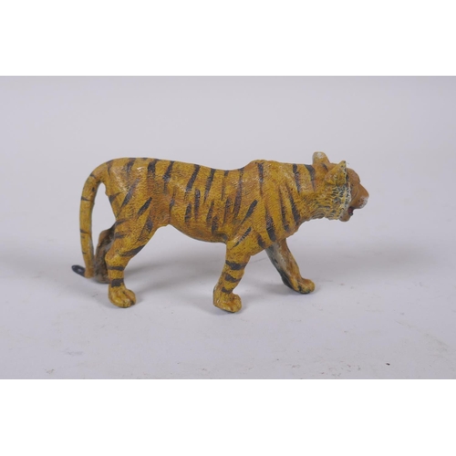 23 - A cold painted bronze tiger, after Bergmann, 10cm long