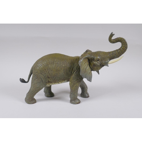 27 - A Vienna style cold painted bronze elephant, 33cm long