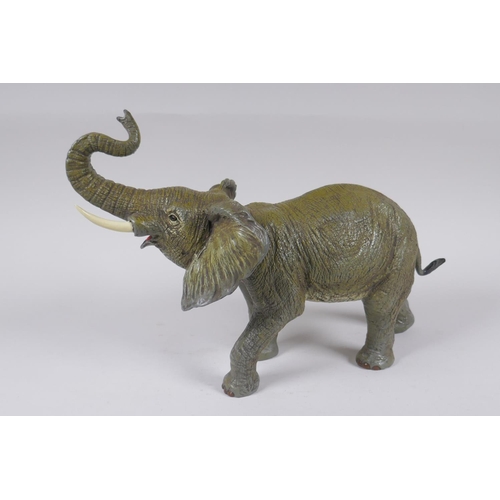 27 - A Vienna style cold painted bronze elephant, 33cm long