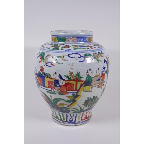 31 - A wucai porcelain jar decorated with boys playing in a garden, Chinese Jiajing 6 character mark to l... 