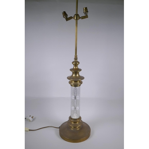 32 - A large brass and glass column table lamp, 97cm high